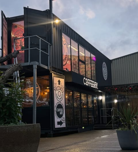 Coffeeboy Headingley at dusk with warm atmospheric lighting