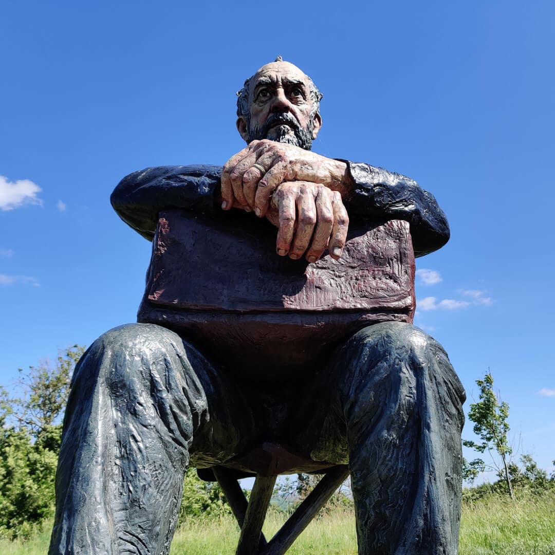 Seated Figure in sun Yorkshire Sculpture Park