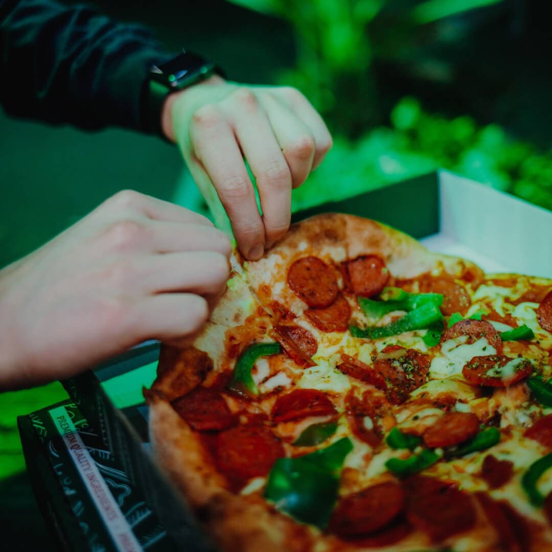 Eating Harpos Pizza - Pizza in box