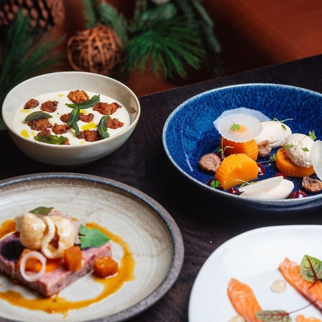 Assorted gourmet dishes served at Crafthouse, featuring artistic plating and vibrant colors.