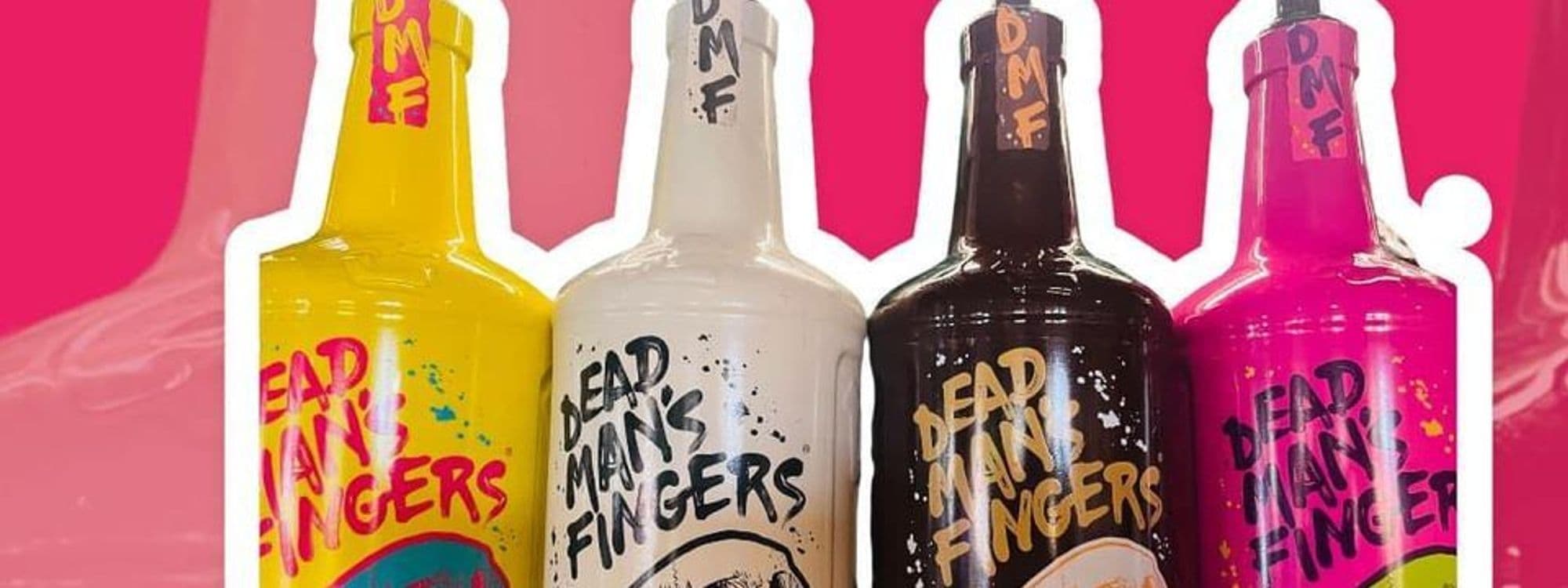 Colorful bottles of Dead Man's Fingers rum on a vibrant pink background at Number Thirty Three.