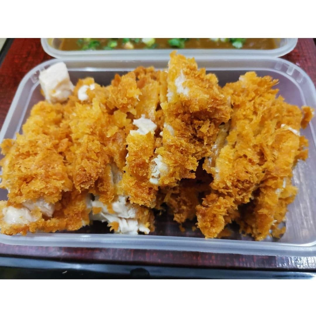 Crispy golden-brown breaded chicken served at Fuji Hiro, showcasing a popular dish for visitors to enjoy.