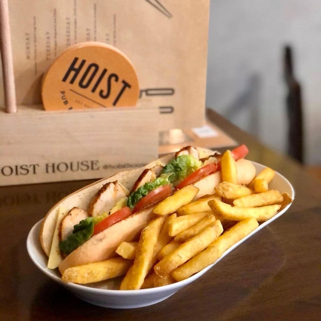 Delicious chicken gyro with fresh vegetables and golden fries served at Hoist House.