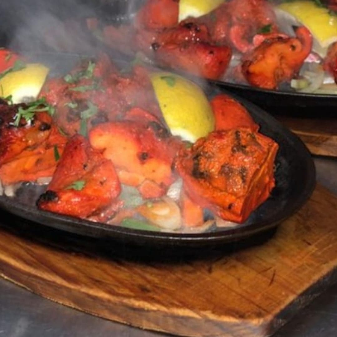 Akmal's Tandoori Bistro — sizzling tandoori mixed grill platter