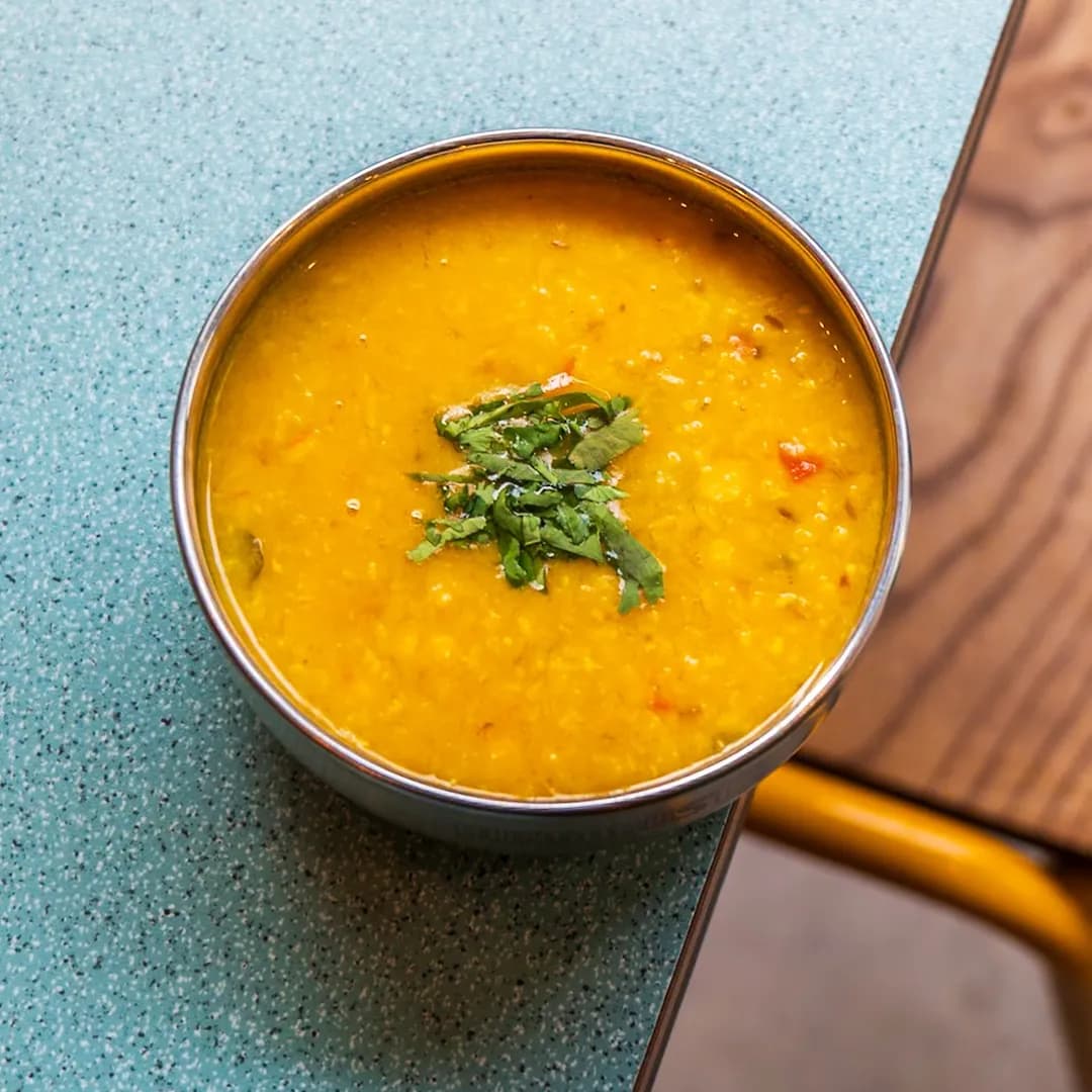 Bundobust tarka dhal topped with fresh coriander