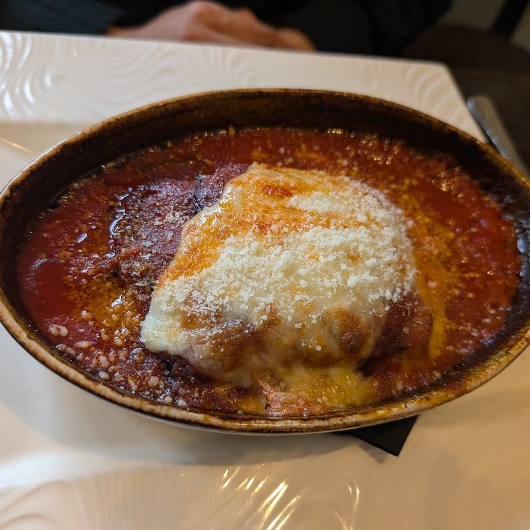 Buon Apps River Lounge — baked pasta in rich tomato sauce