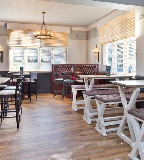 Royal Park Cellars bar area with branded logo on wall at The Royal Park Leeds