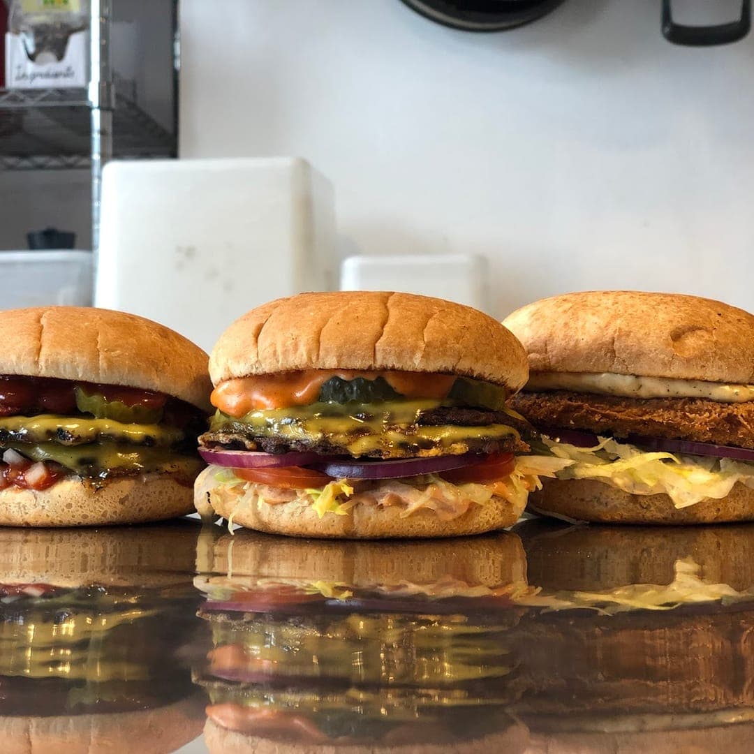 FiveStar burgers and shakes — three smash burgers lined up on the counter