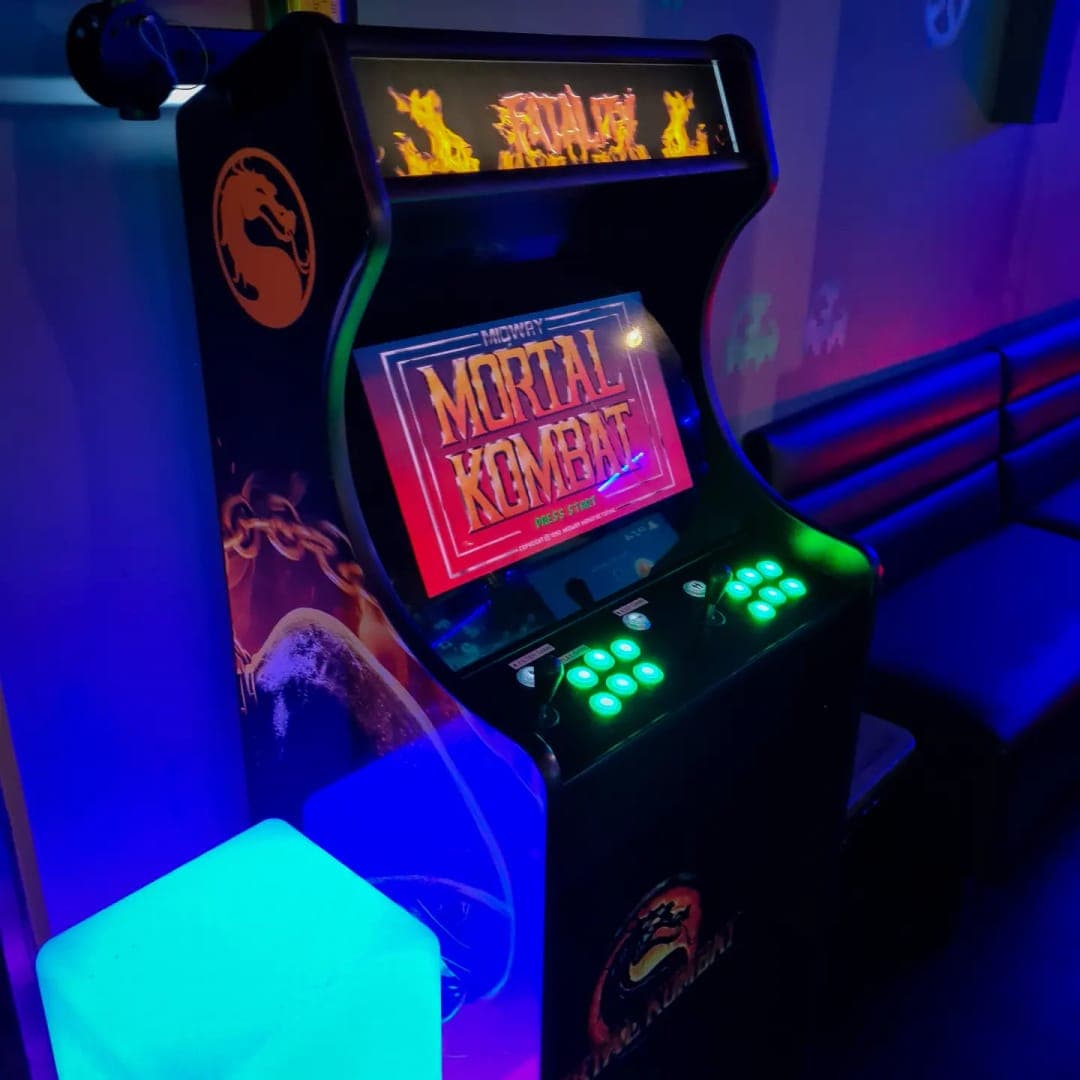 Mortal Kombat arcade cabinet with green LED buttons at Pixel Bar Leeds