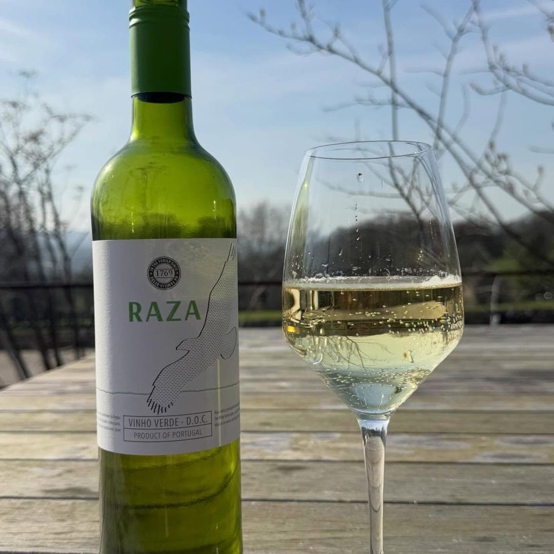 The Penny Bun — wine bottle and glass on outdoor terrace