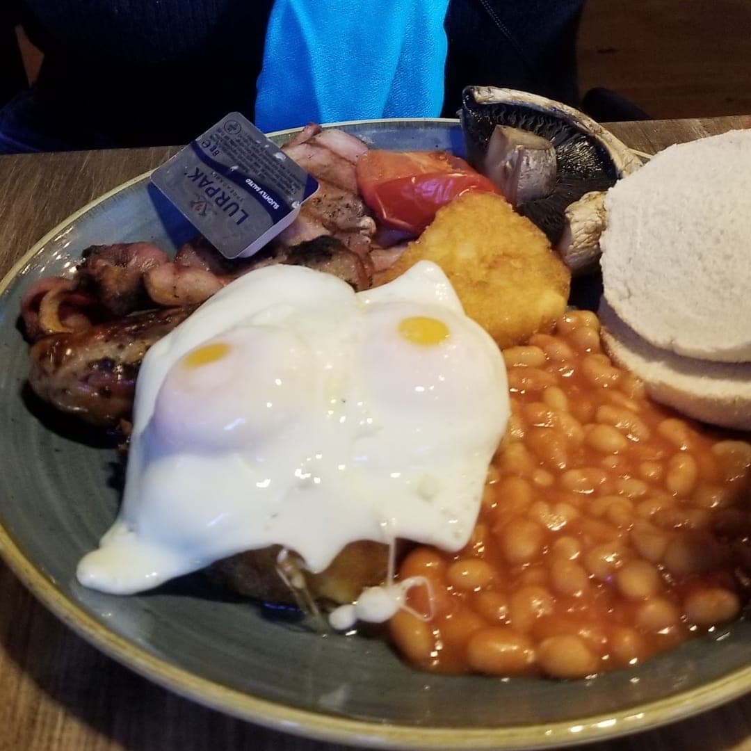 The Scarbrough Hotel — full English breakfast with fried eggs, bacon, beans, hash brown, and mushroom
