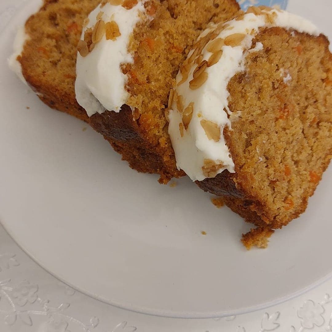 Carrot cake slice with cream cheese frosting at 21 Co.