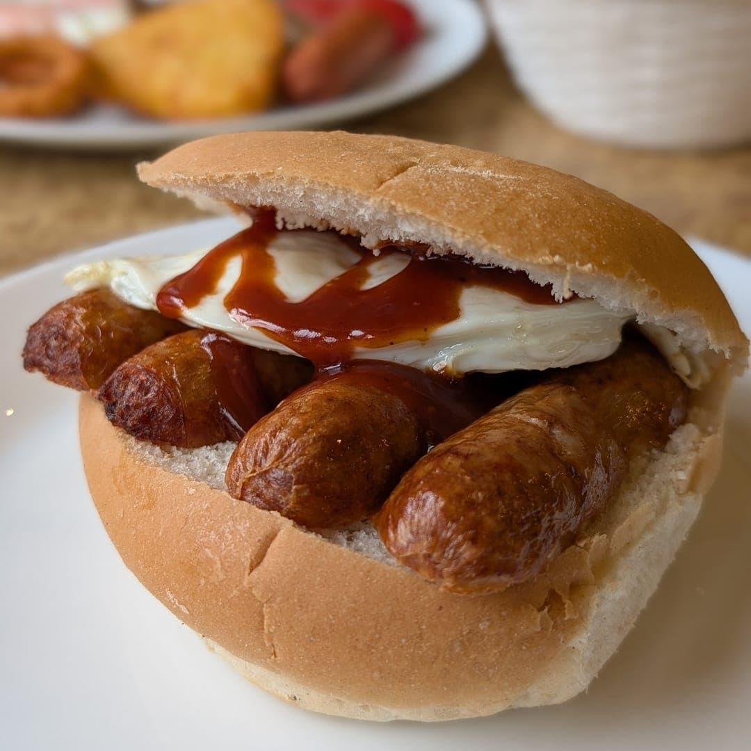 Sausage and egg bap with brown sauce at Chichini cafe Leeds