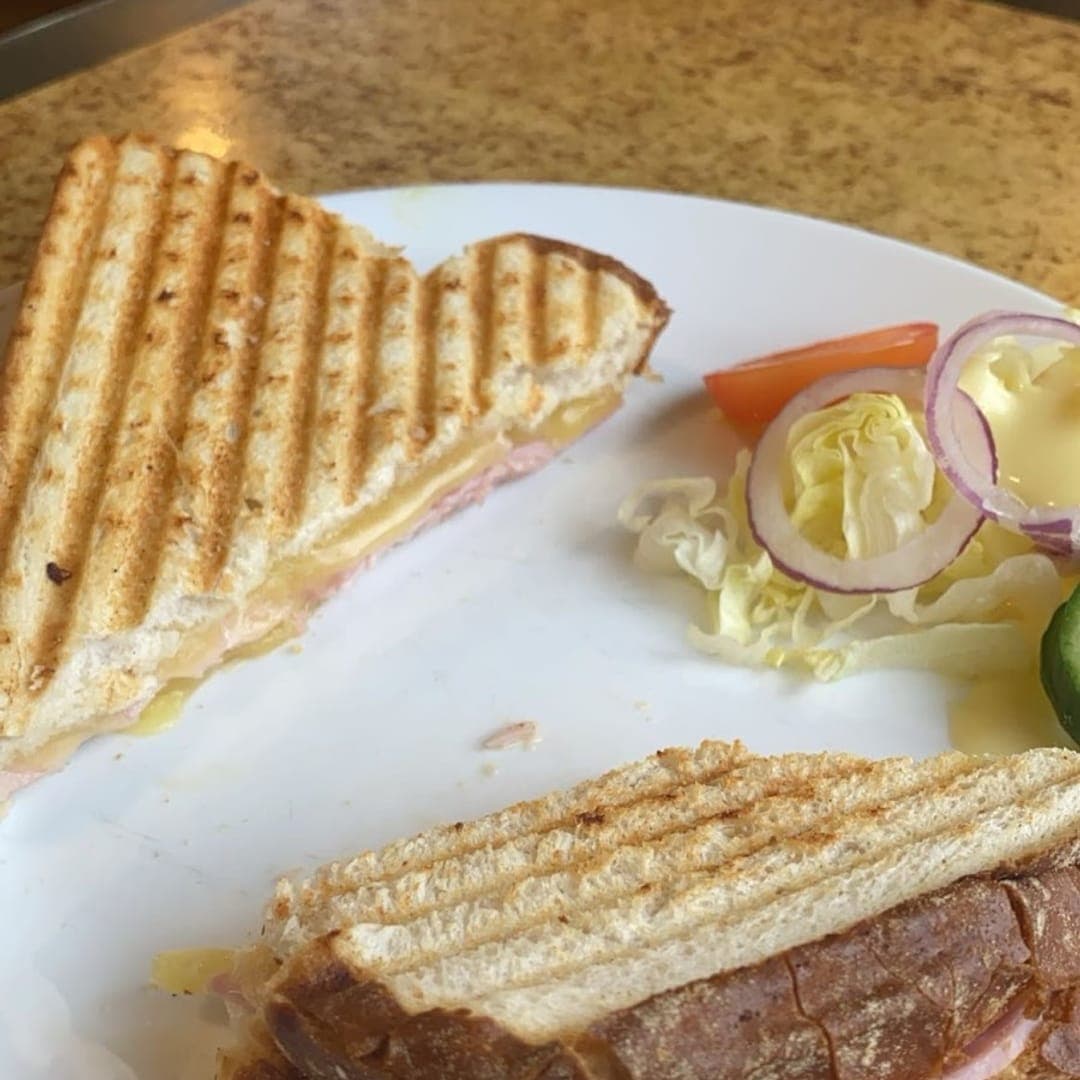 Toasted ham panini served with side salad at Chichini cafe Leeds