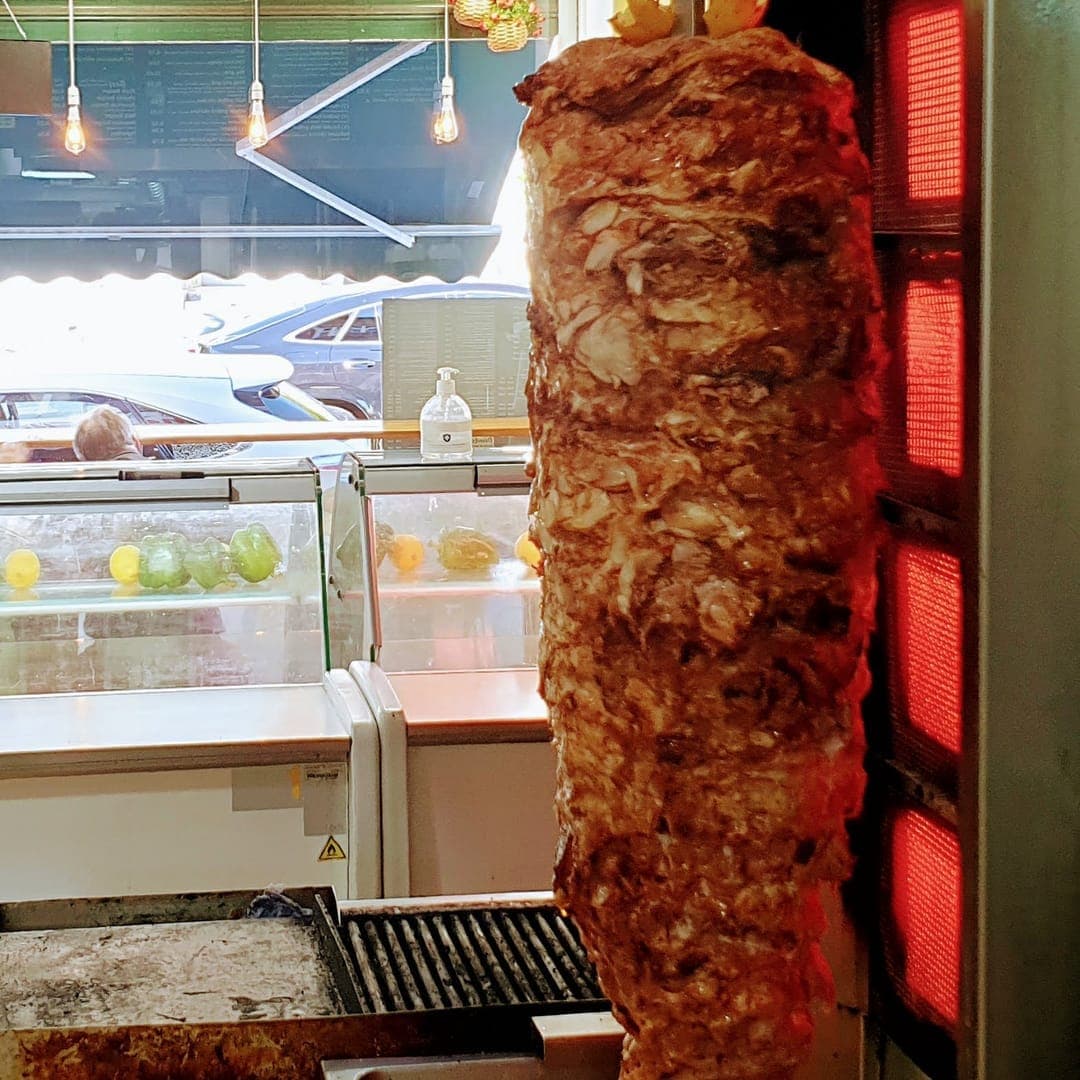 Lebanese Bites — shawarma spit on vertical grill