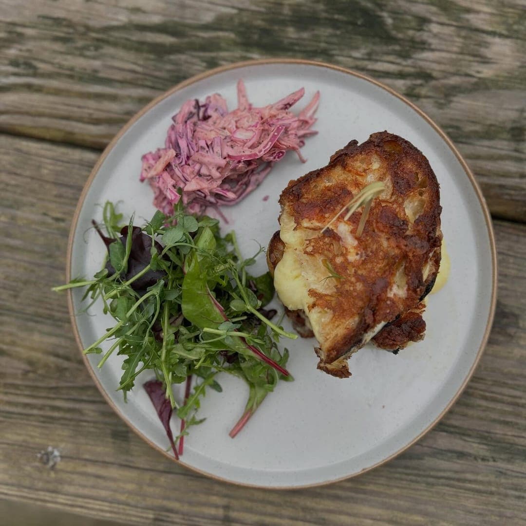 MISTÅL Kitchen — grilled cheese sourdough with salad and slaw