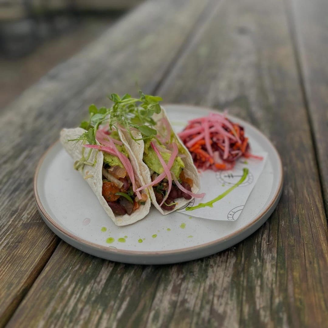 MISTÅL Kitchen — spiced tacos with avocado and pickled onions