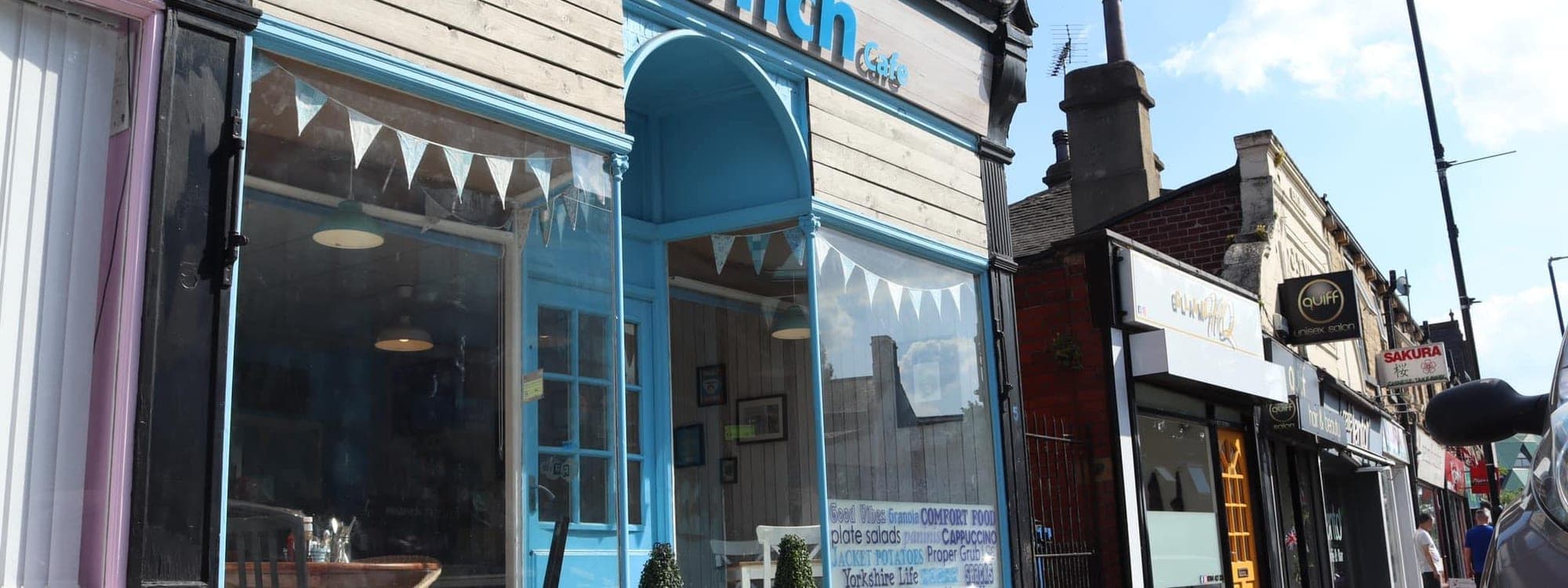 Munch Cafe English Kitchen — blue shopfront exterior on Headingley high street