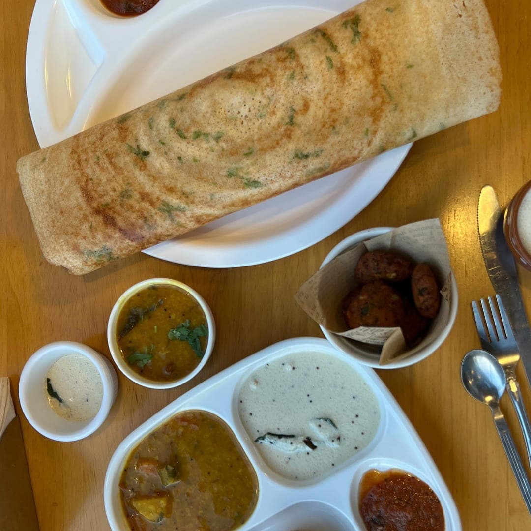 Munch Cafe English Kitchen — dosa with chutneys and South Indian thali with vada