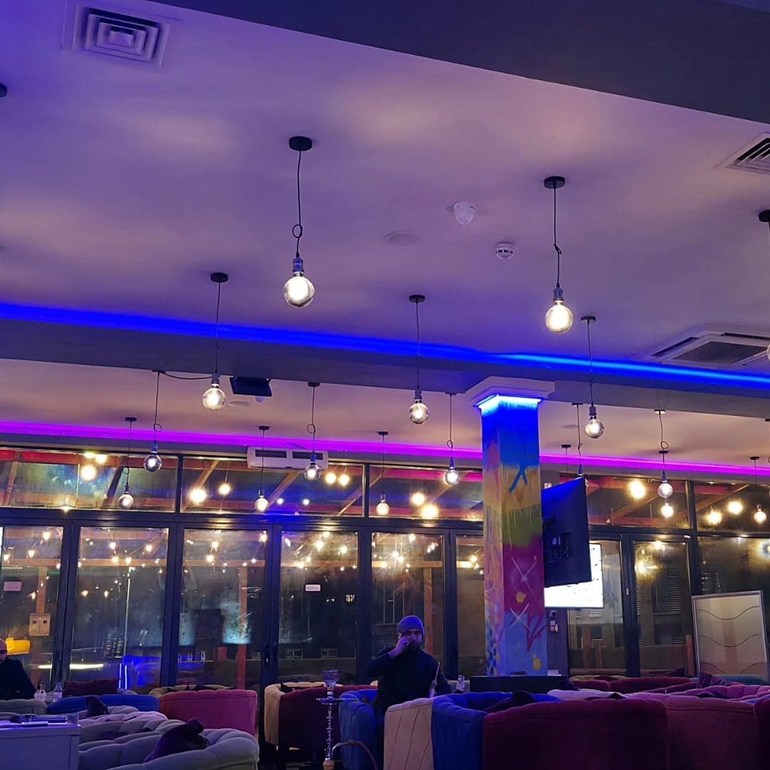 Panorama Garden — interior with colourful LED lighting and hanging pendant lights
