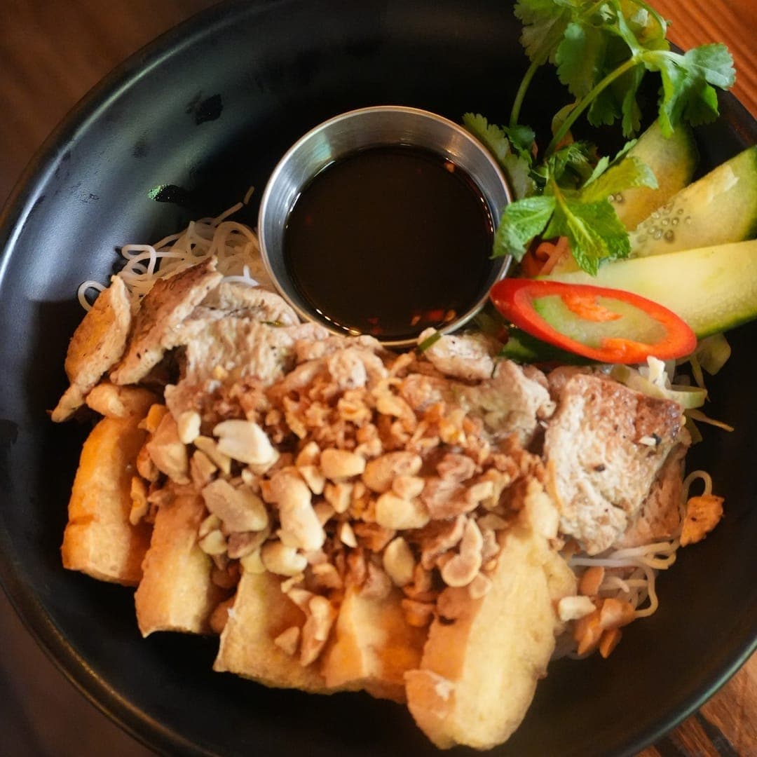 Pho 37 (Merrion Centre) — overhead view of Bun Cha noodle dish with dipping sauce and fresh garnish