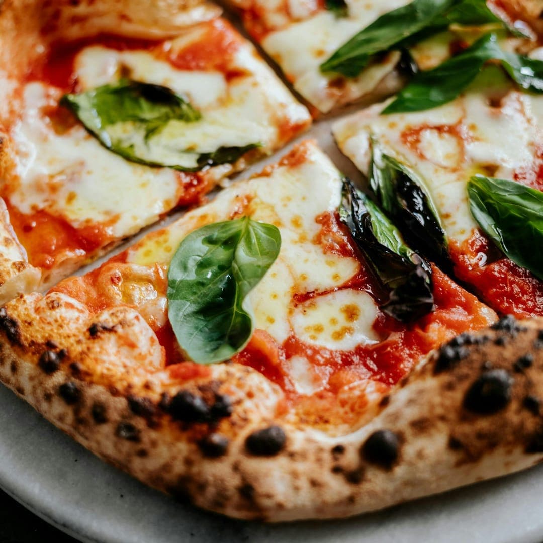 Secret Sky — stone-baked margherita pizza with fresh basil