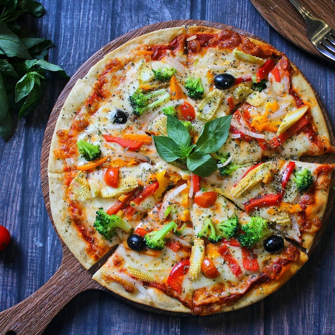 Secret Sky — colourful vegetarian pizza with broccoli and peppers