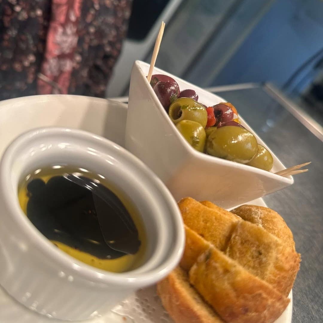 Bread, olives and olive oil at Sous Le Nez Leeds bar