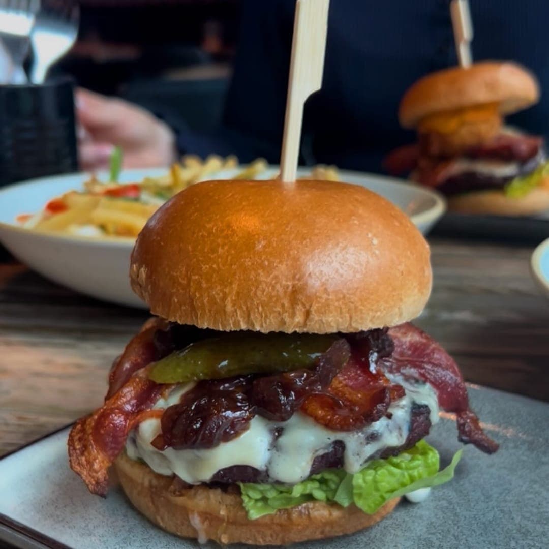 The Good Luck Club — The Bluey burger with bacon, jalapeño, and melted cheese