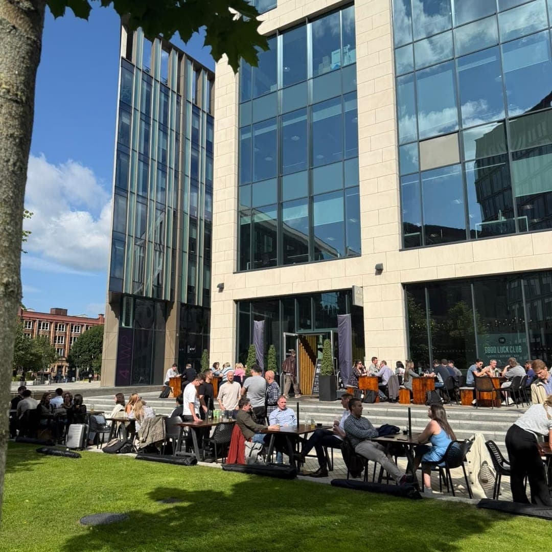 The Good Luck Club — outdoor terrace packed with diners on a sunny day at Wellington Place