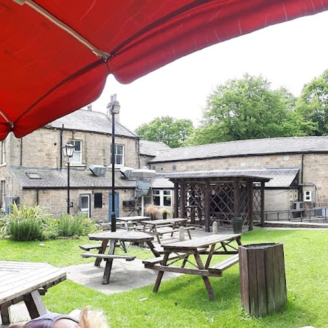 Vesper Gate — sunny beer garden with picnic benches