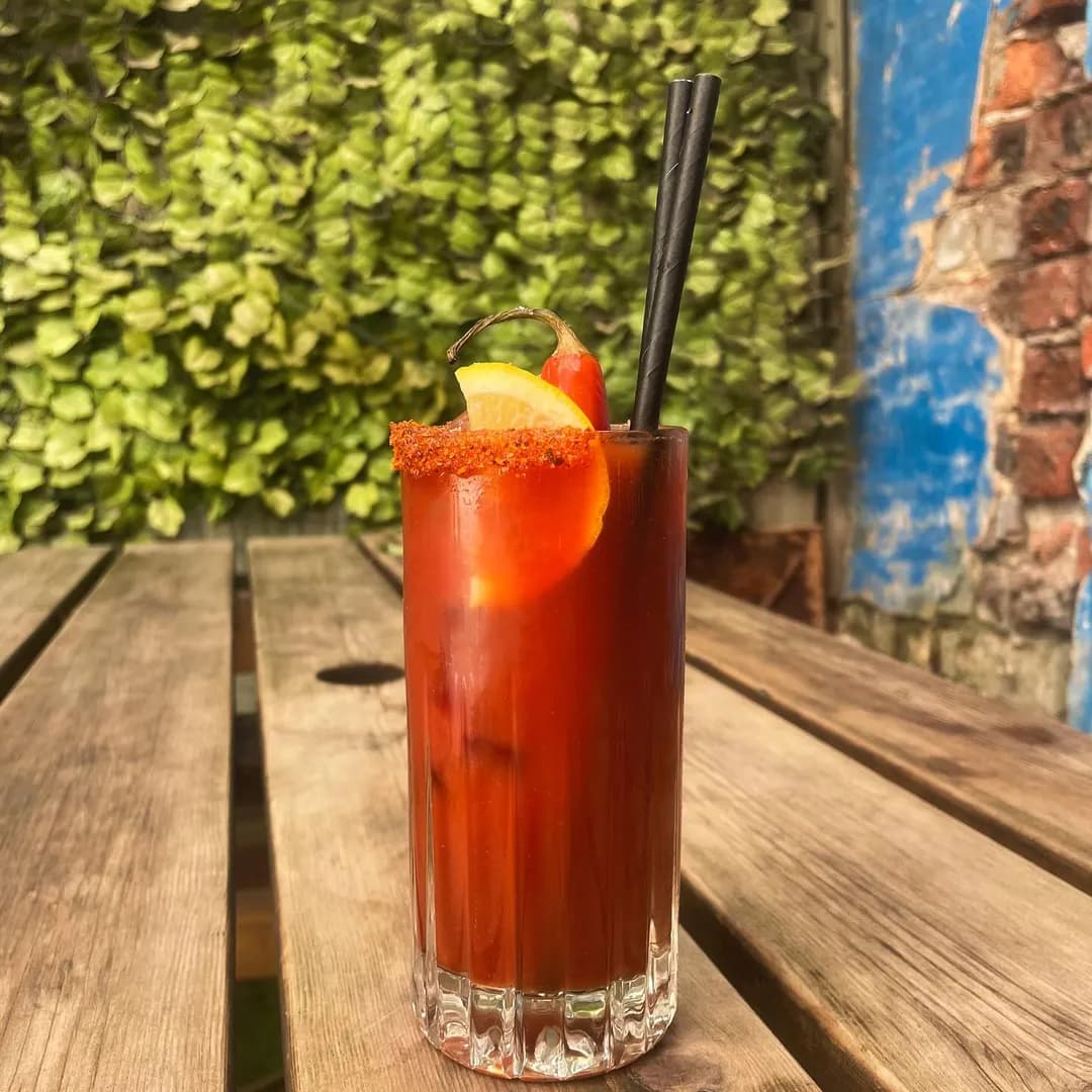 Bloody Mary with chili rim garnish on outdoor table at Wapentake Leeds