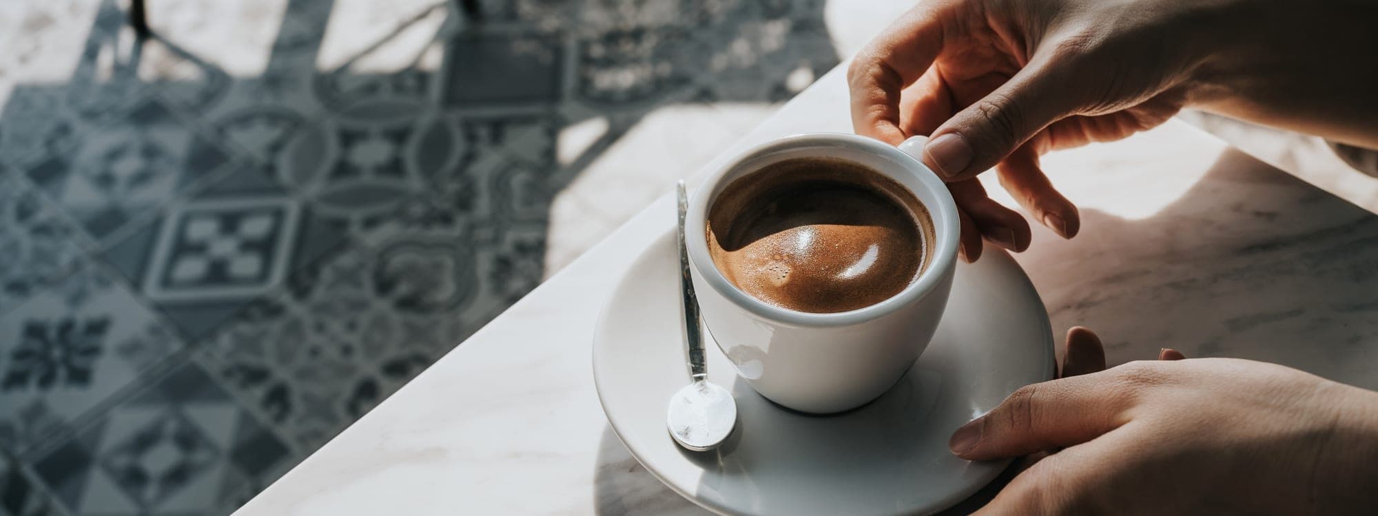 Aws Caffe - Roundhay Road — interior seating area with warm lighting