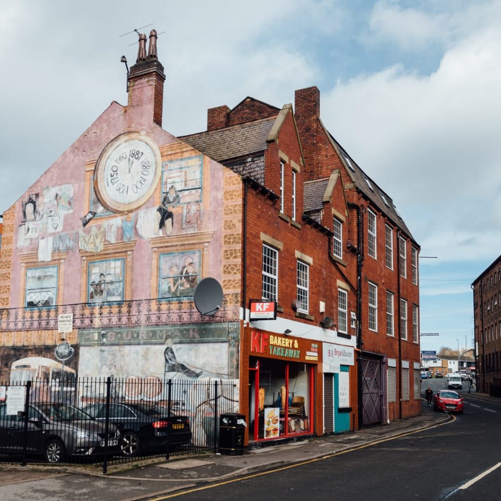 Mabgate Mural by Janet de Wagt at 93 Mabgate, Leeds — 1987 community piece featuring portraits of local school students