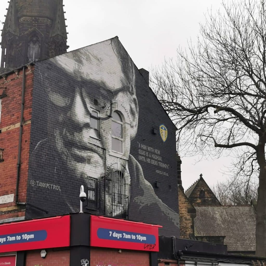 Marcelo Bielsa mural — wider street view from Hyde Park Road showing the mural in context with the surrounding terraced housing