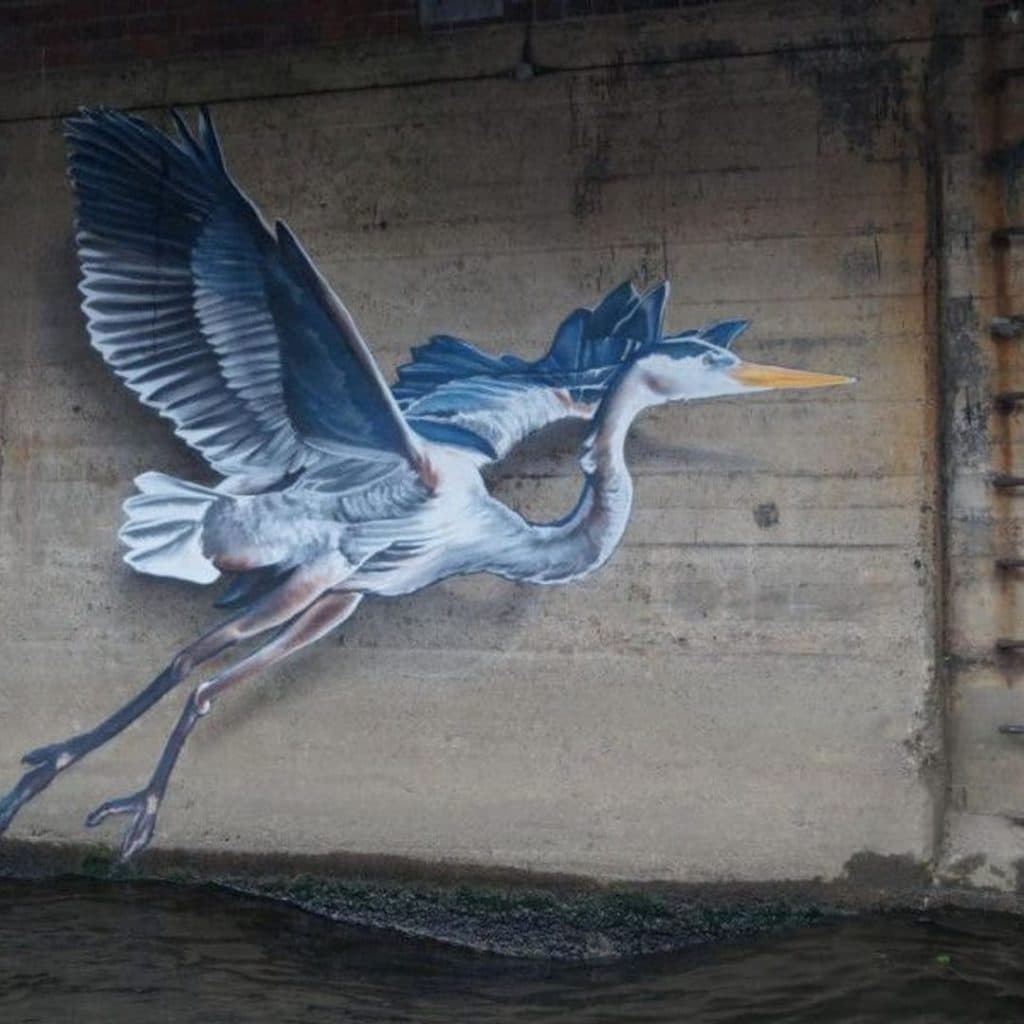 The Barge — a 100-year-old painted dredger boat moored on the River Aire at 46 The Calls, Leeds, transformed by Benjamin Craven and Jenny Beard