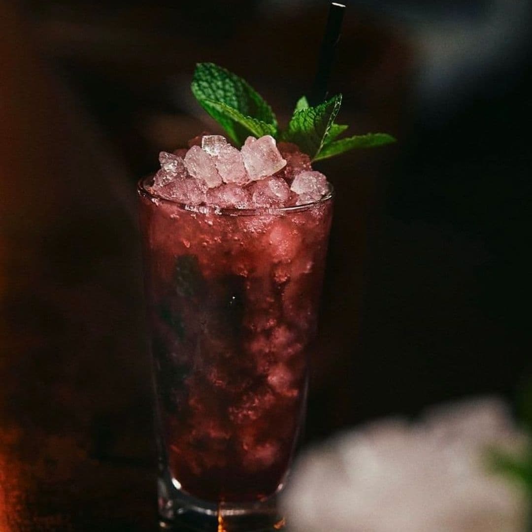 The East Village Cocktail Mint Garnish Crushed Ice Iced cocktail with mint garnish in The East Village.