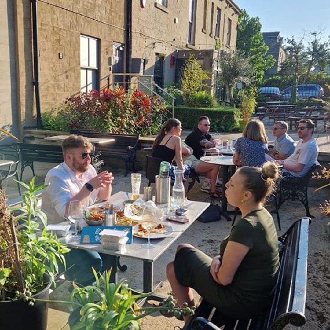 The Cats Pyjamas Chapel Allerton Outdoor Dining Sunny Afternoon Social Gathering Outdoor dining at The Cat’s Pyjamas – Chapel Allerton with patrons enjoying meals and drinks in the sunshine.