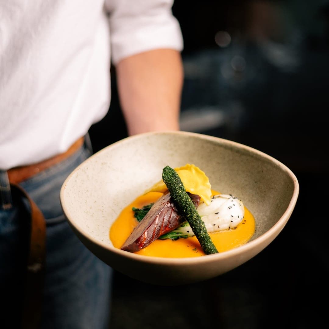 gallery-1772619298097 Baked treacle-cured salmon with sesame pak choi at CrowdedHouse Leeds