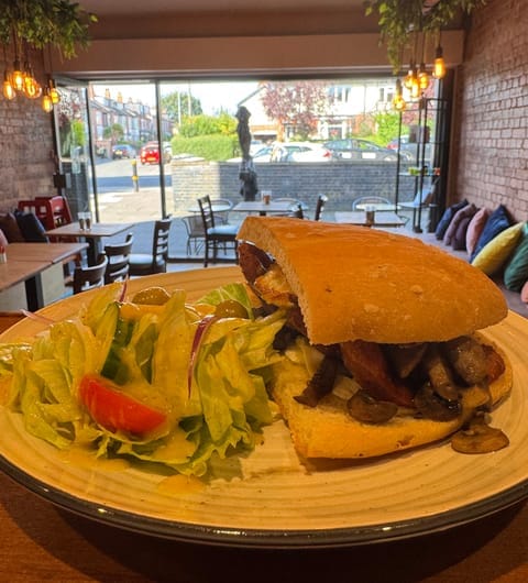 96-location-cafe-card 96 location Cafe — filled baguette with mushrooms and side salad